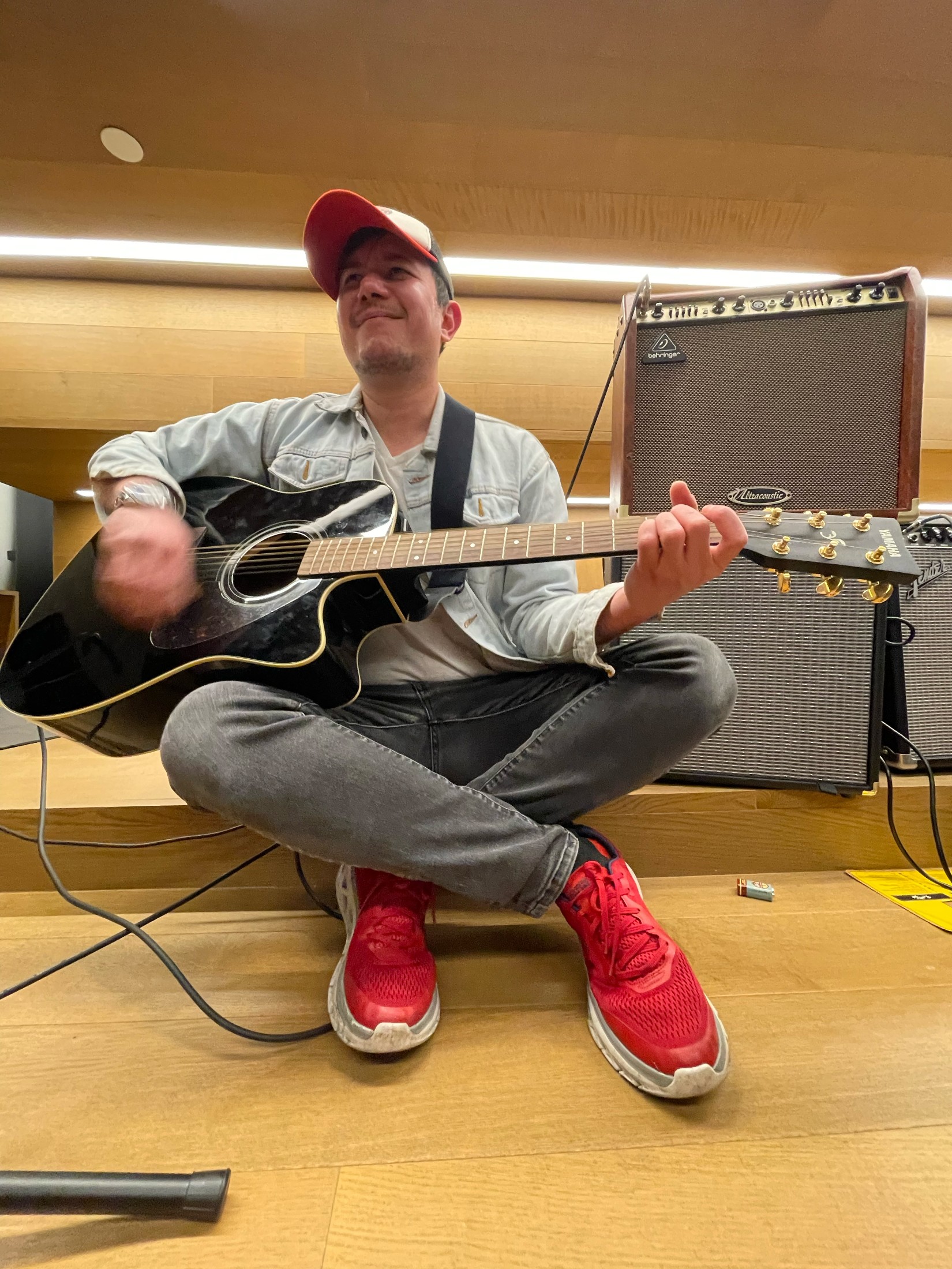Off stage with a guitar — the songwriter side